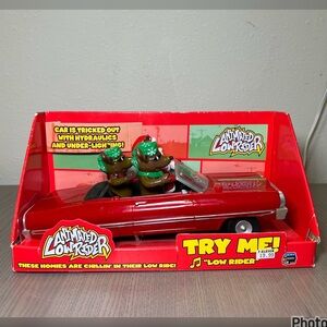 ( SOLD ) GEMMY SANTA & REINDEER TOY CAR - LOW RIDER SONG LIGHTS JUMP